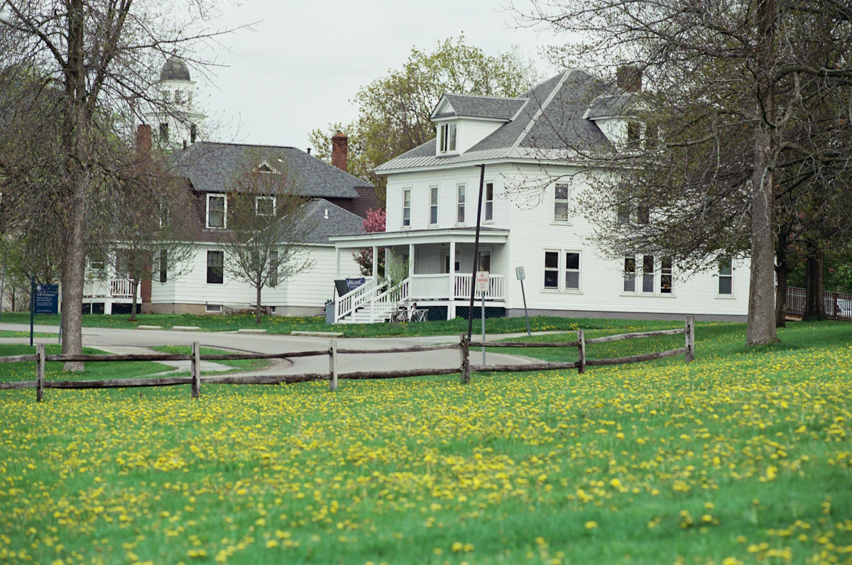 Clean white houses with maintained exterior siding