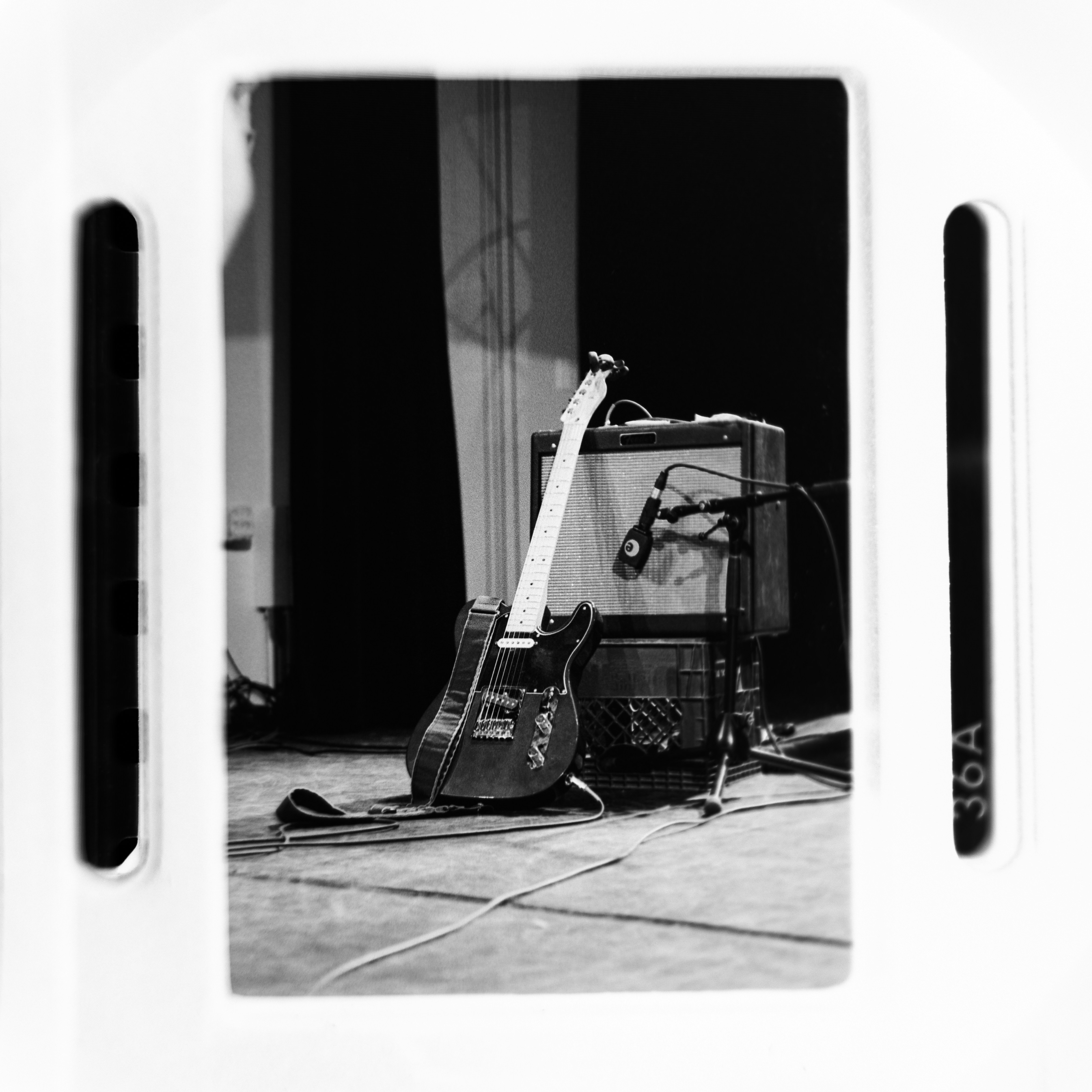 Electric guitar and amplifier on a stage