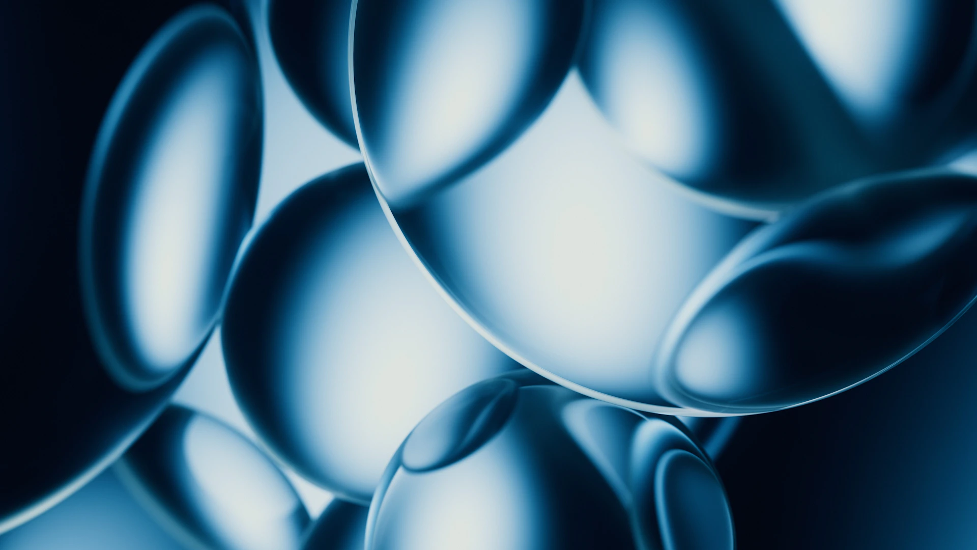 Abstract blue spheres with bright highlights