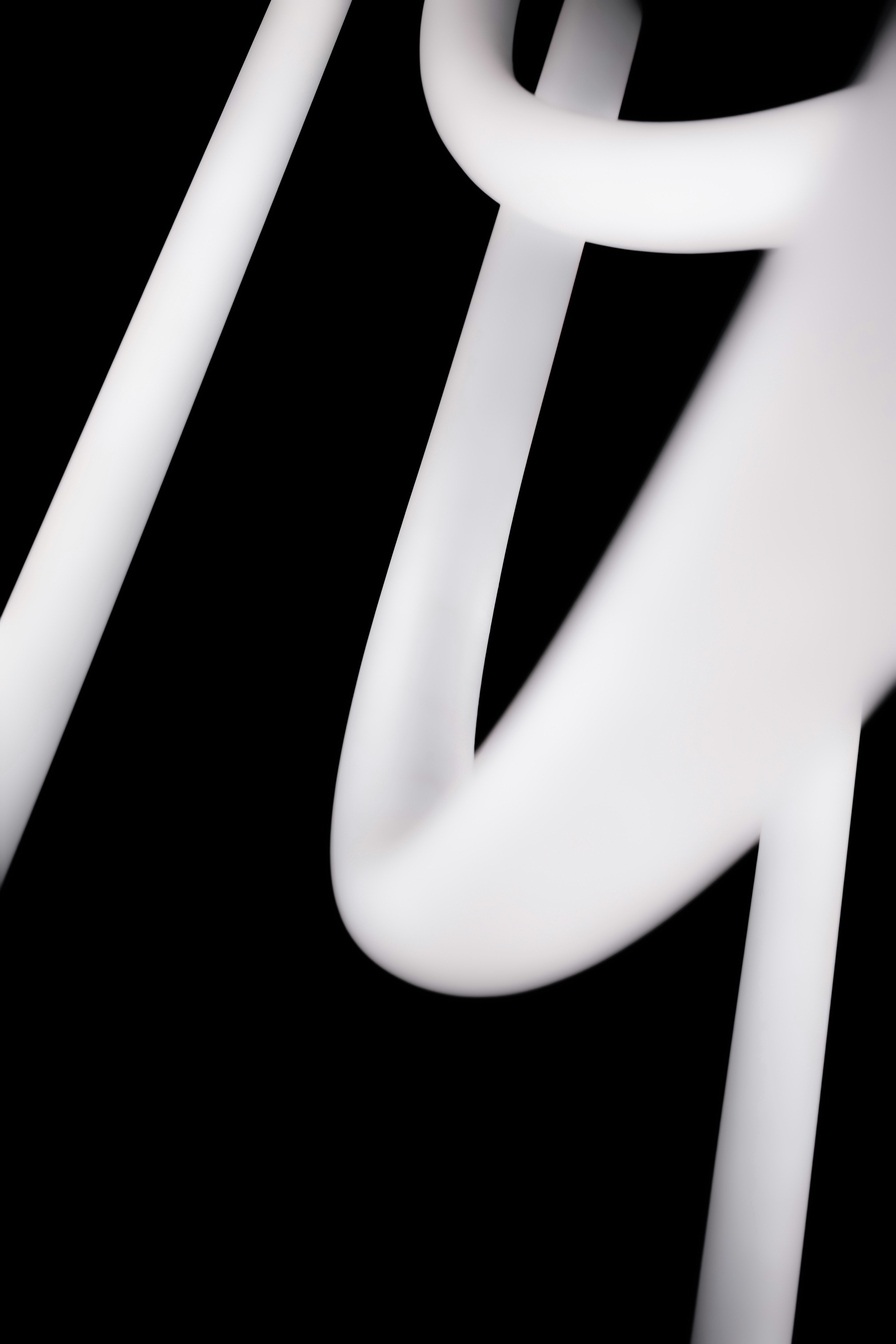 Abstract white curves on a black background