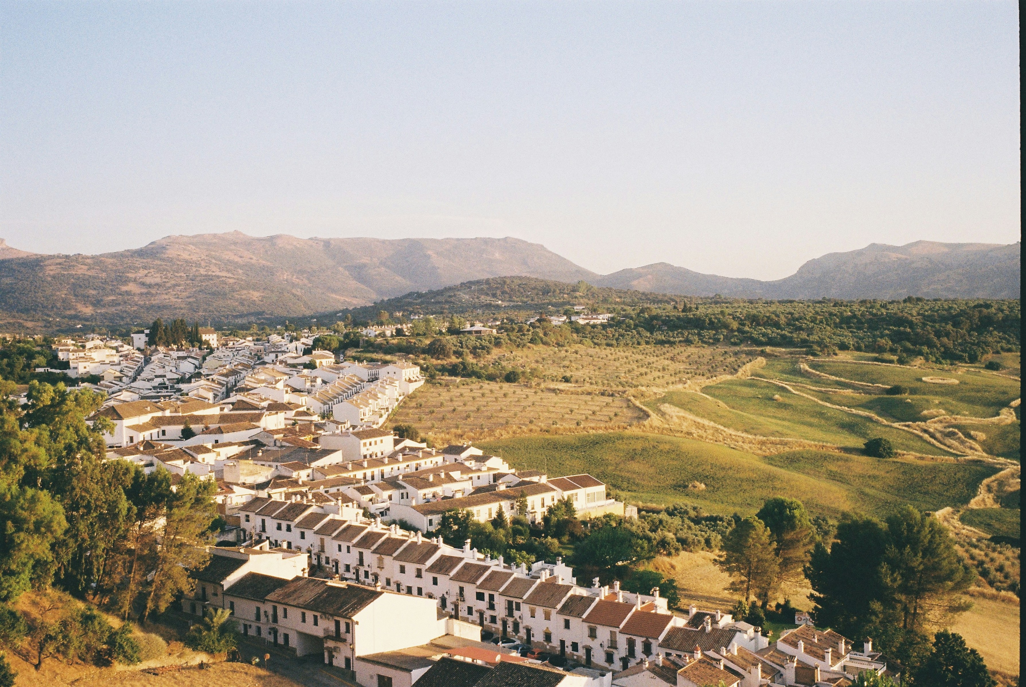 Andalusian white village of Ronda perched on cliffs in Spain