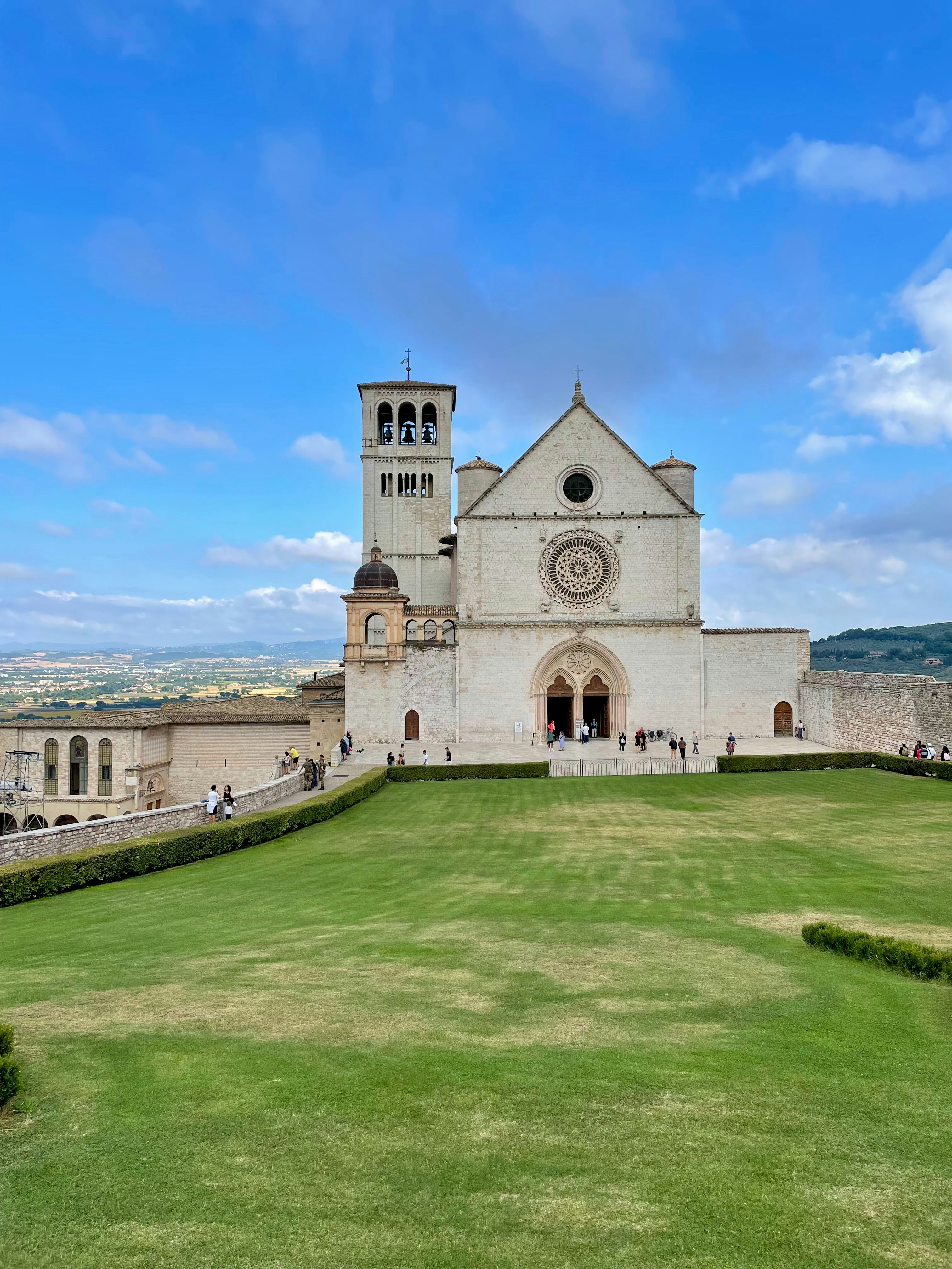 Basilica of saint francis of assisi with green lawn