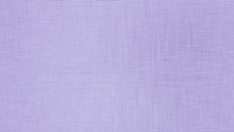A light purple textured fabric background