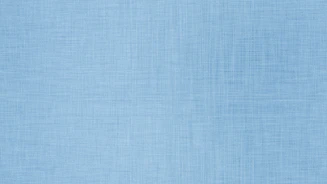A solid light blue textured background