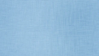 A solid light blue textured background