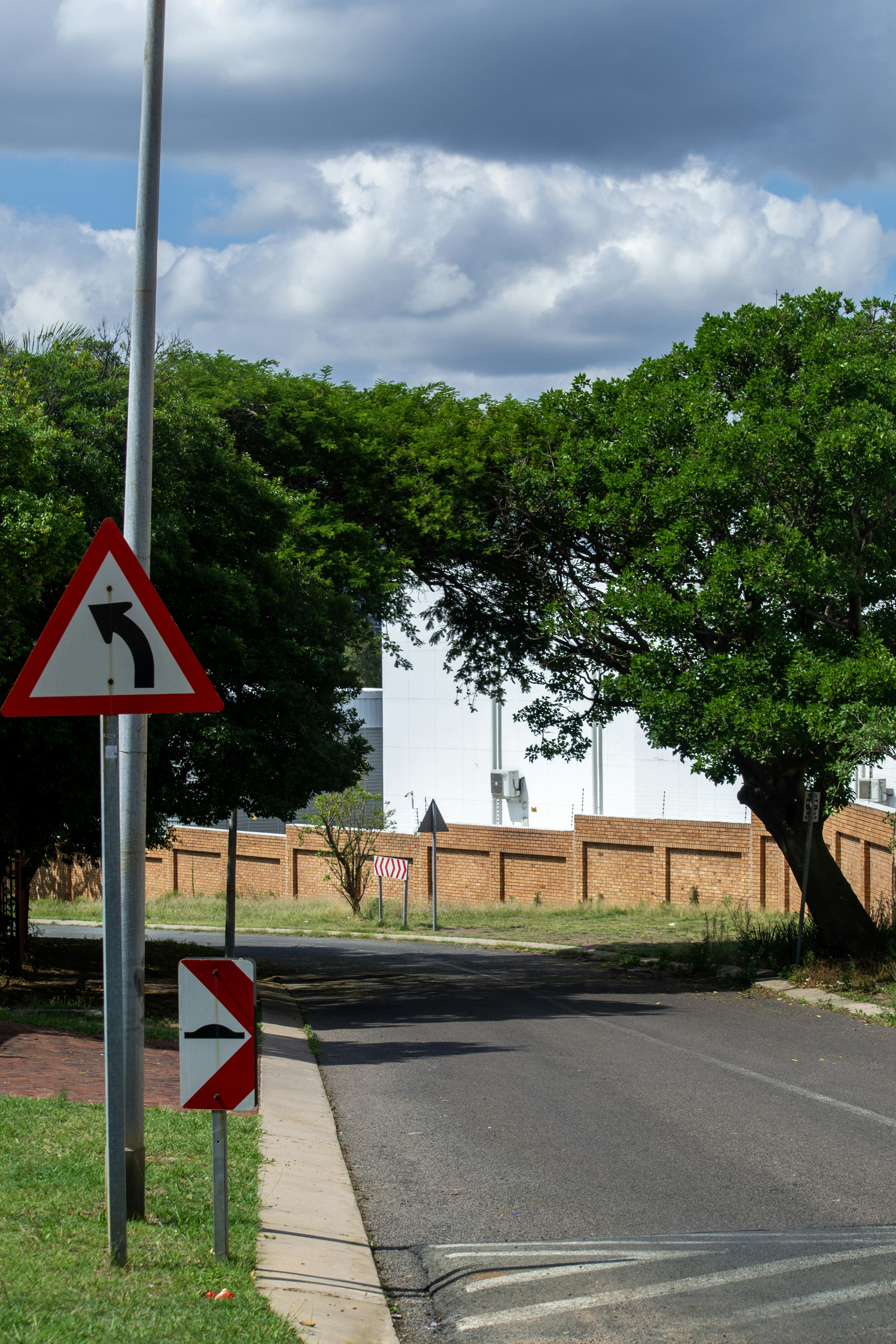 Road with traffic signs and trees