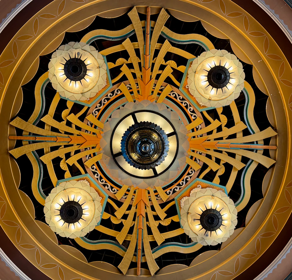 Art deco ceiling with geometric light fixture
