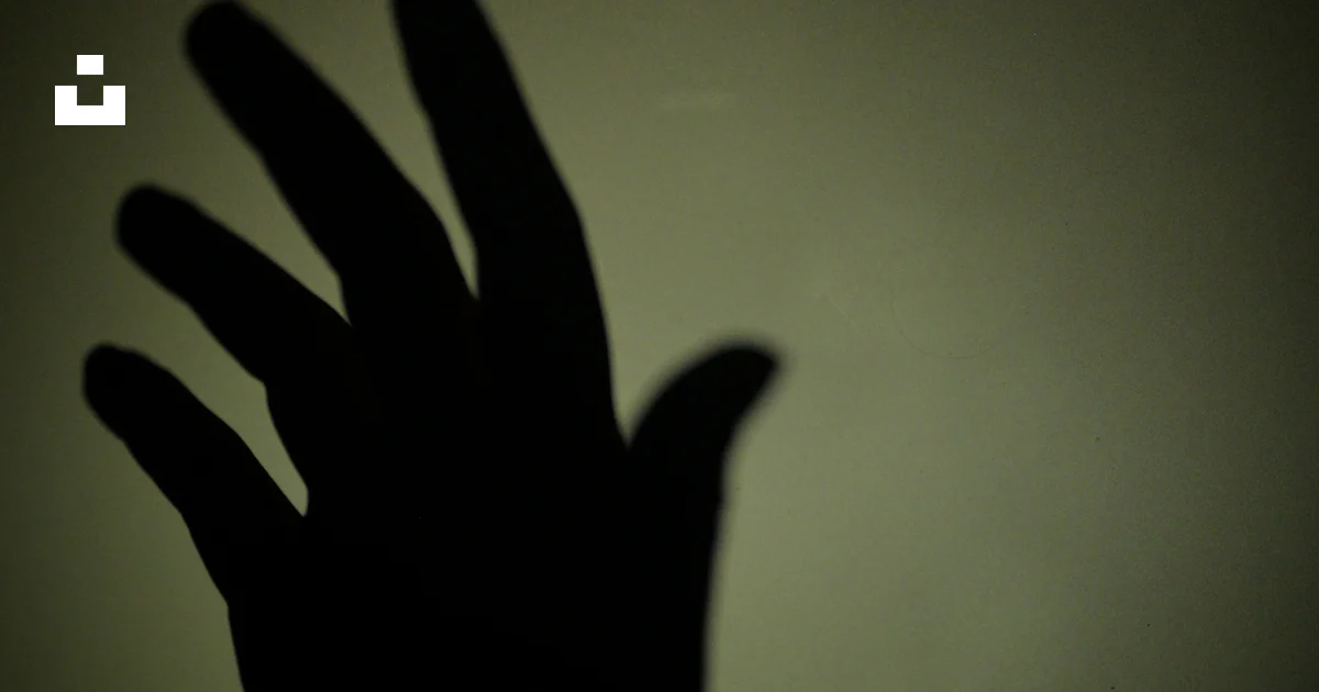 Shadow of a hand reaching out on wall photo – Free Dark background ...