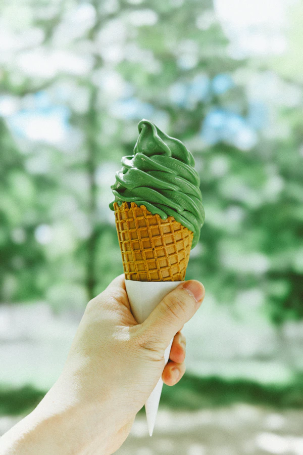 Matcha soft serve ice cream cone