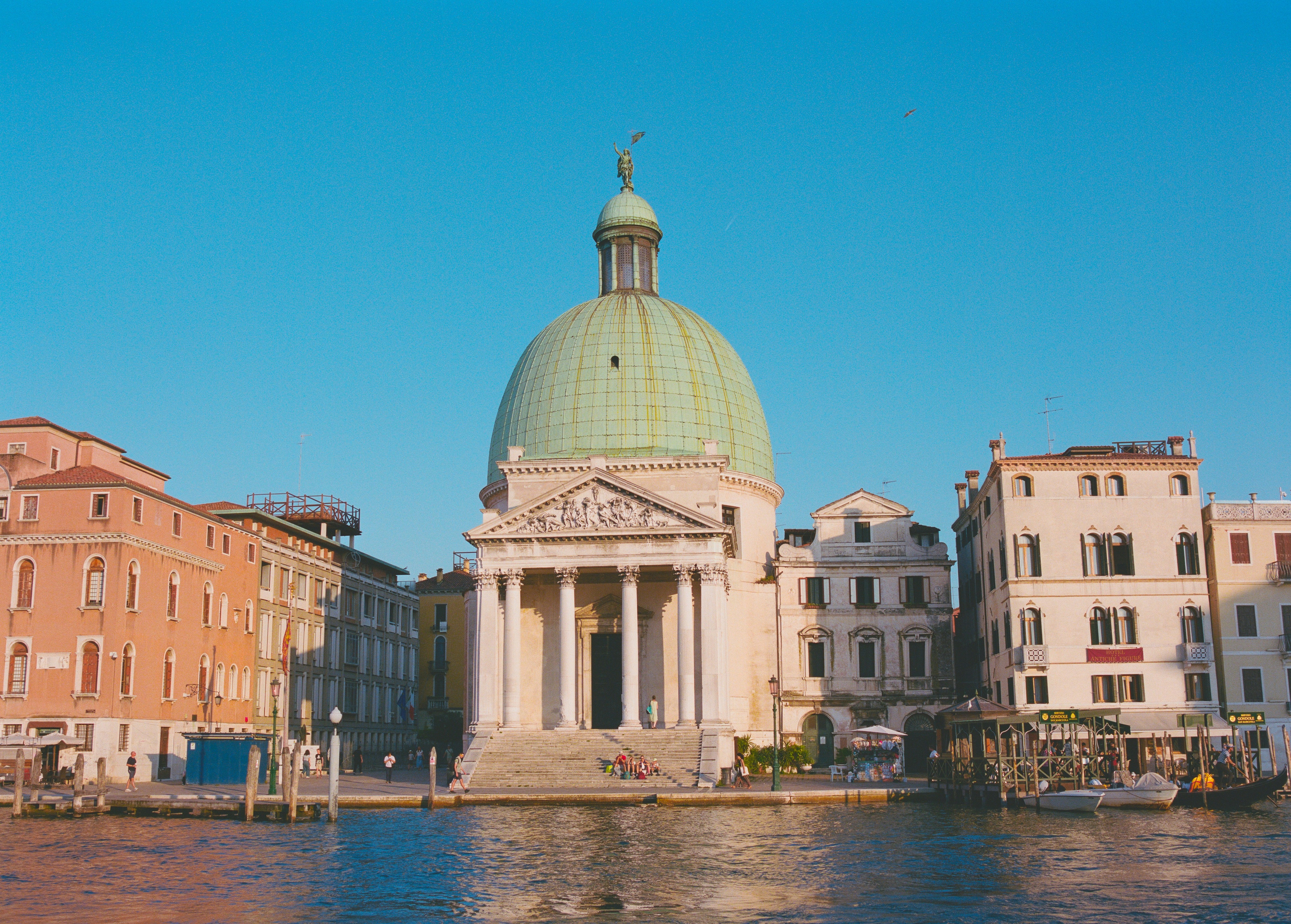 Grand building with dome on canal