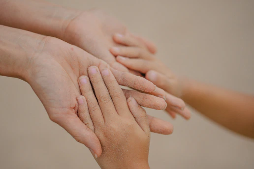 Multiple hands of different sizes layered together