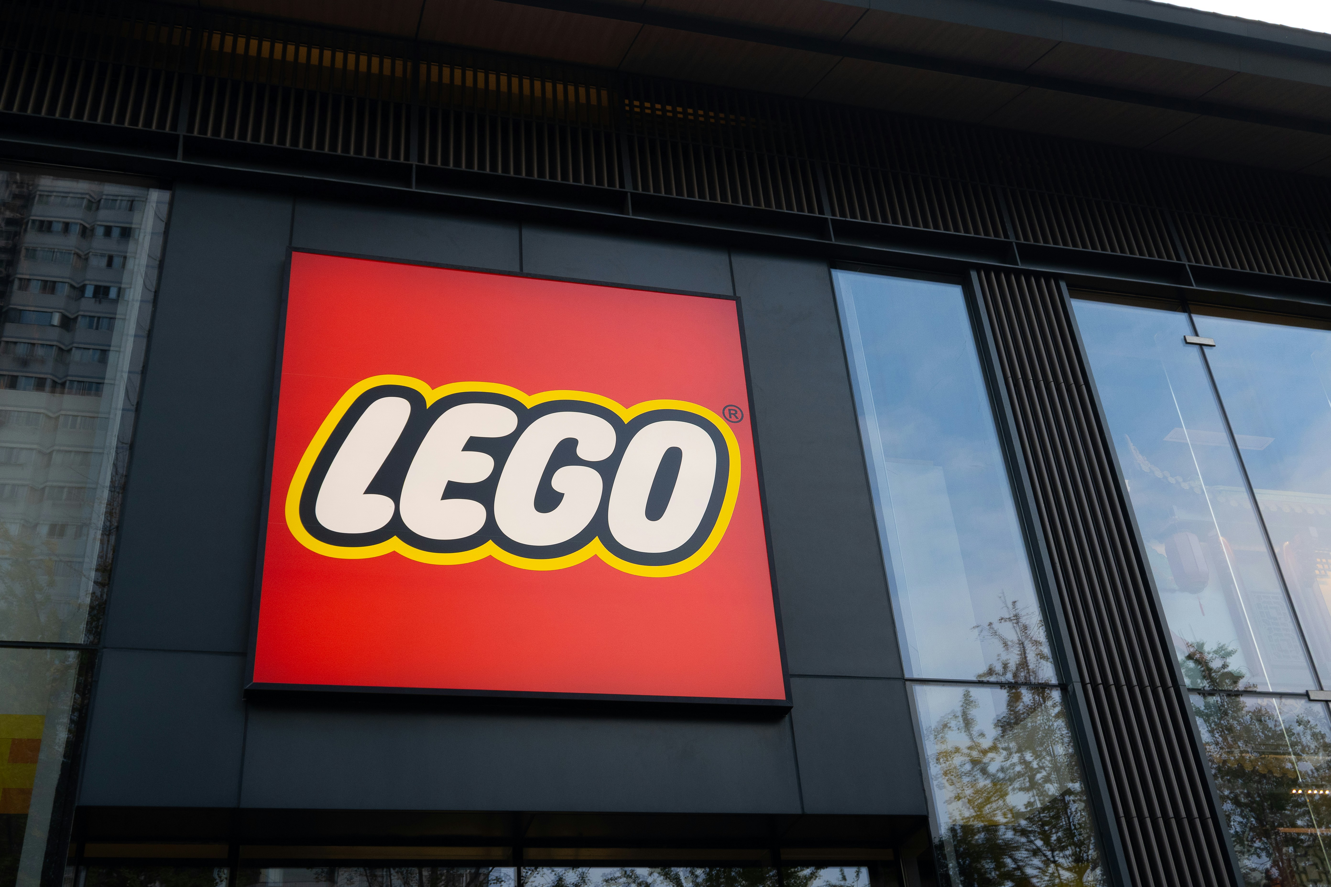 The lego store logo on a building facade. photo – Free Marketing Image ...