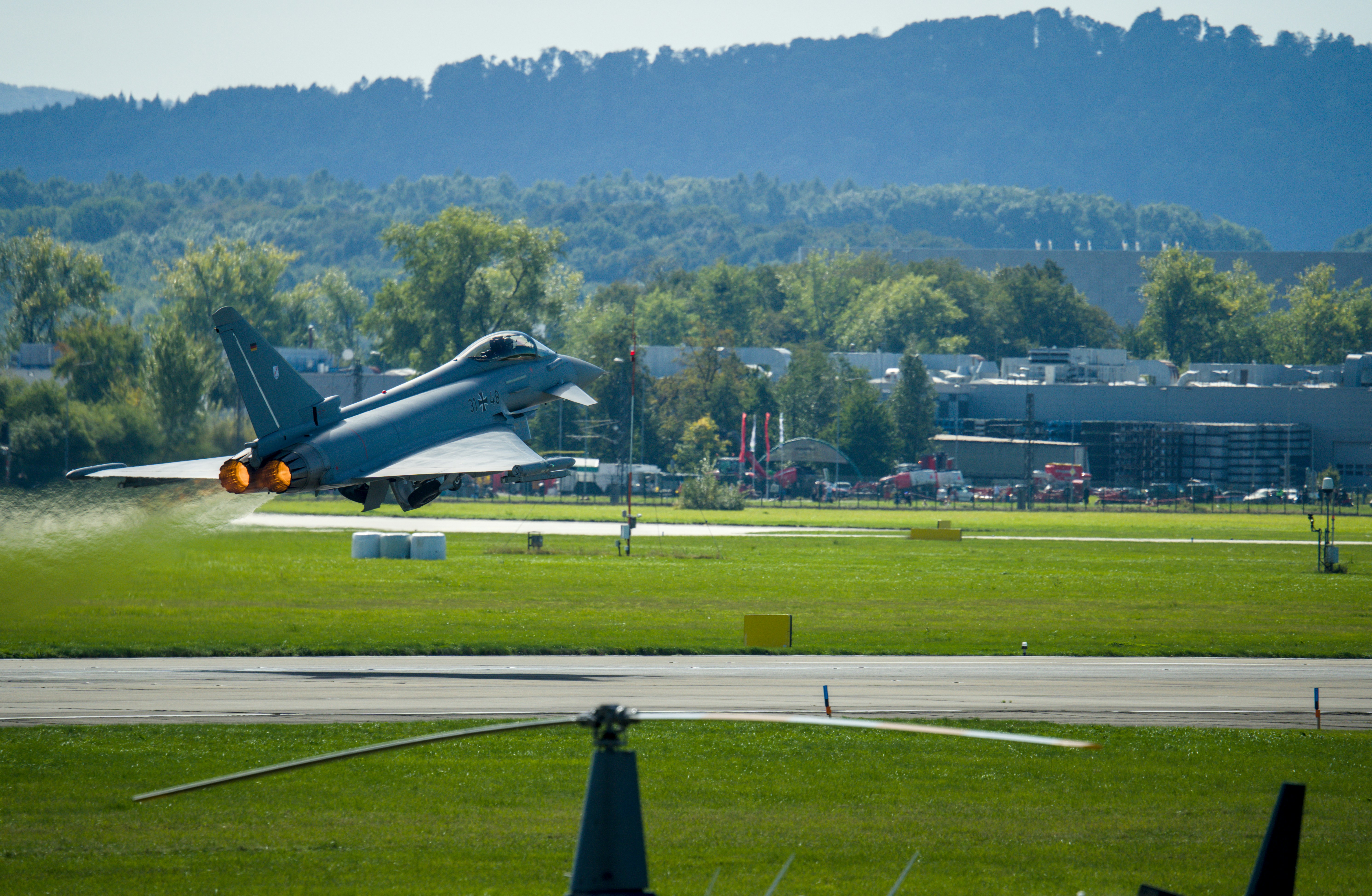 Fighter jet taking off from a runway