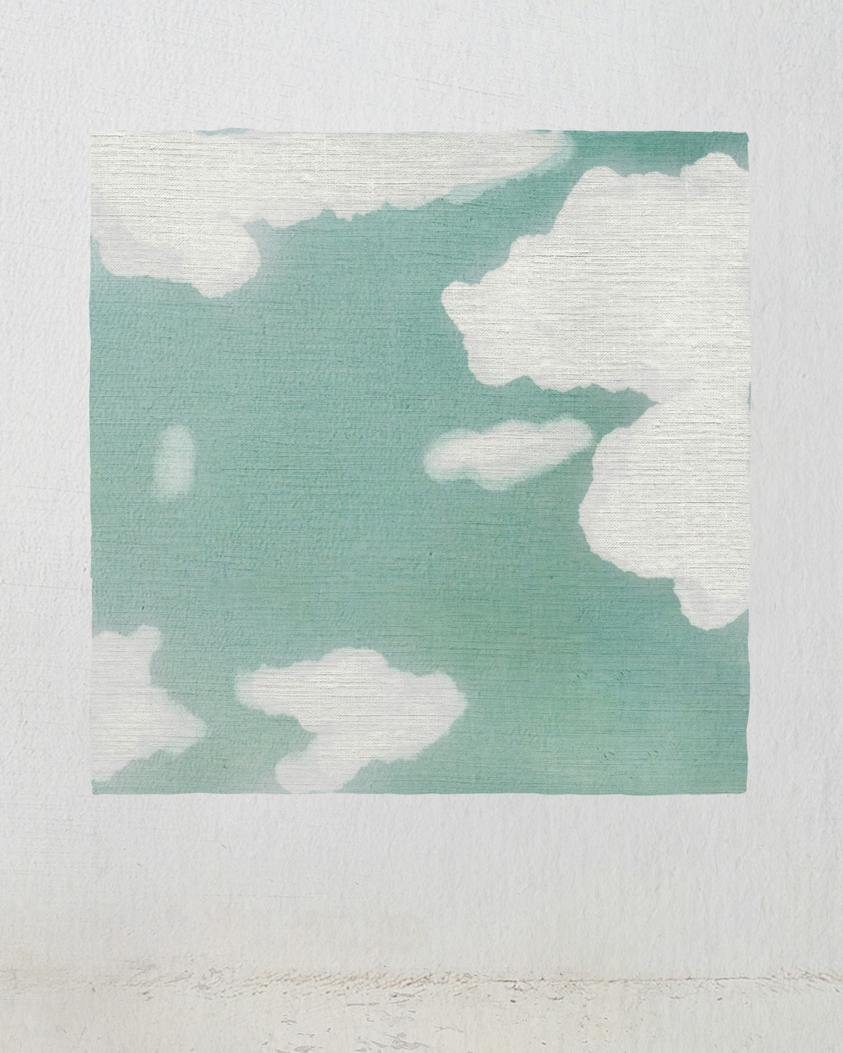 White clouds drift across a soft blue sky.