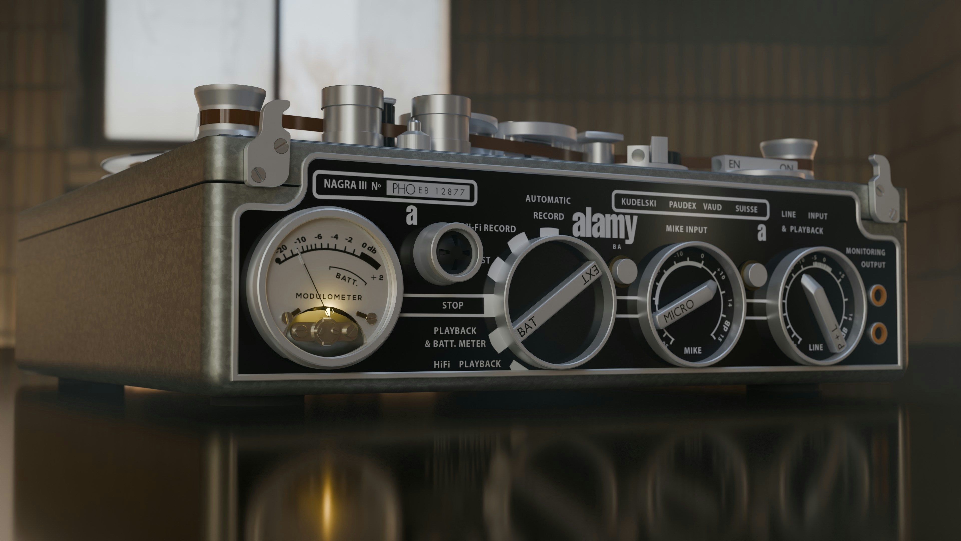 Vintage reel-to-reel tape recorder with vu meter