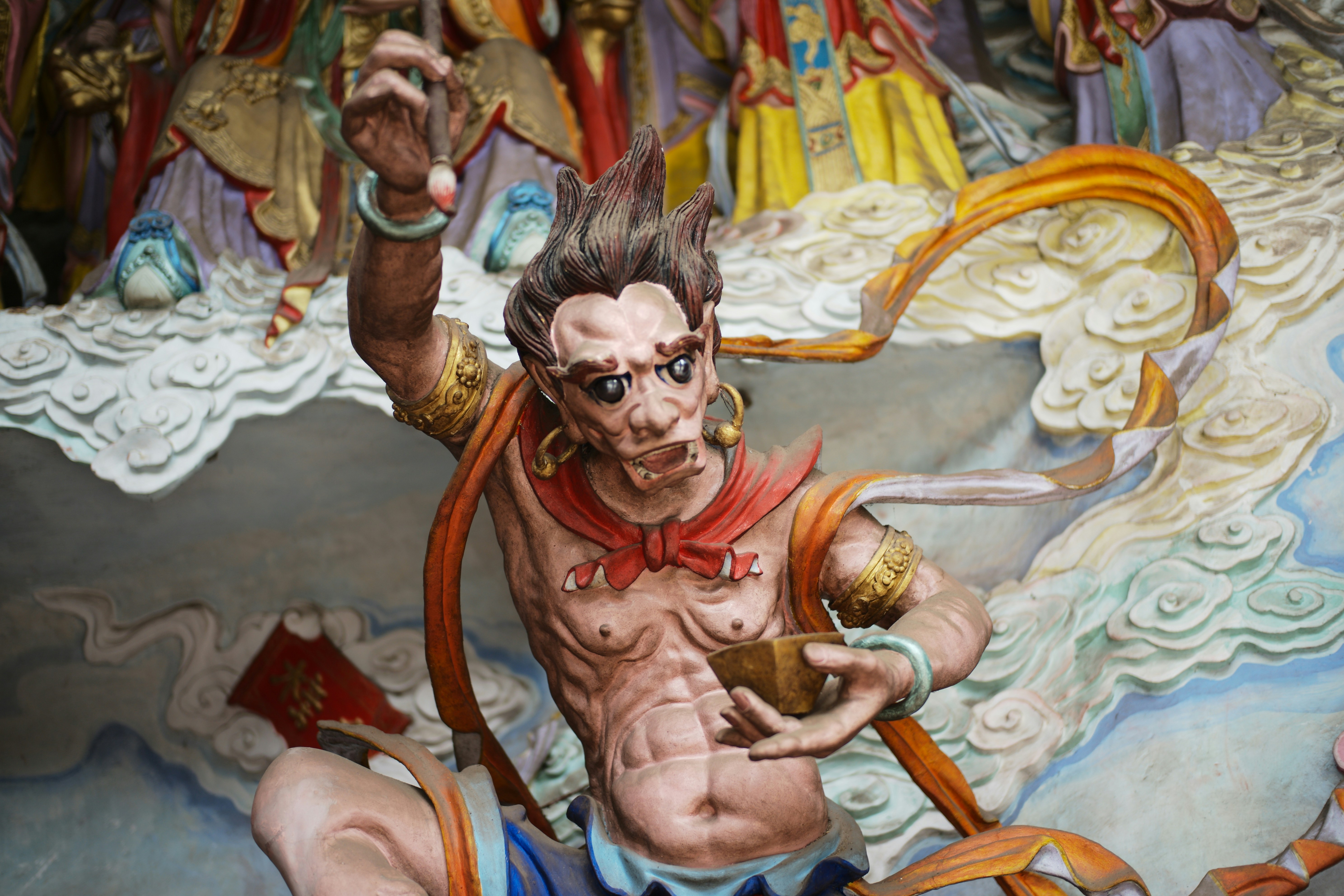 Detailed statue of a mythical creature with fierce expression