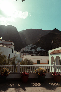 White buildings nestled in a mountain valley.