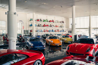 Collection of luxury cars in a showroom