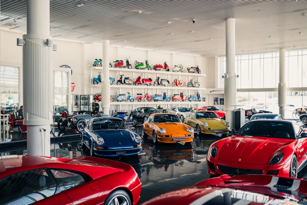 Collection of luxury cars in a showroom