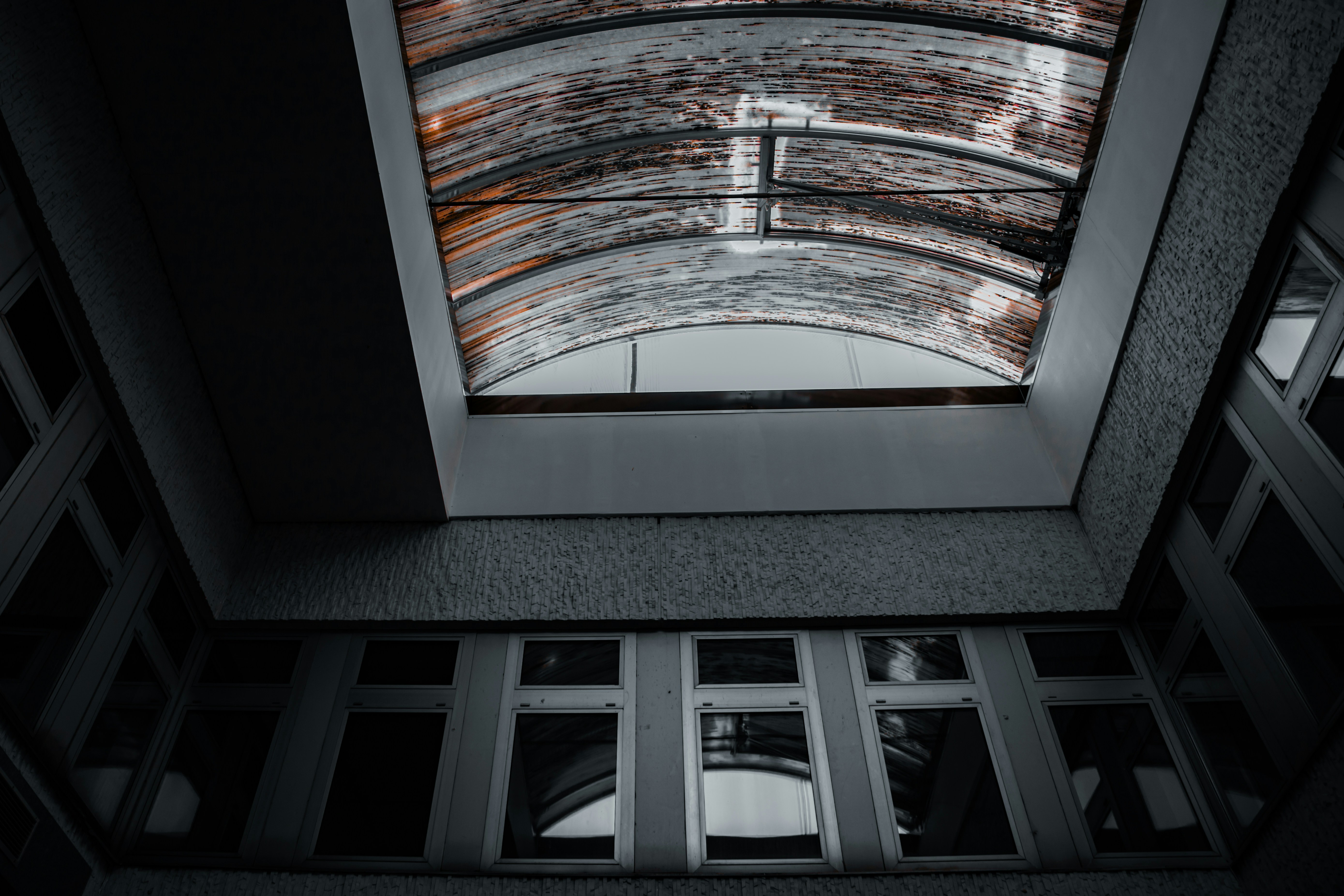 Looking up at a curved skylight from below