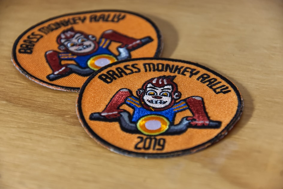 Two "brass monkey rally 2019" patches with monkey design.