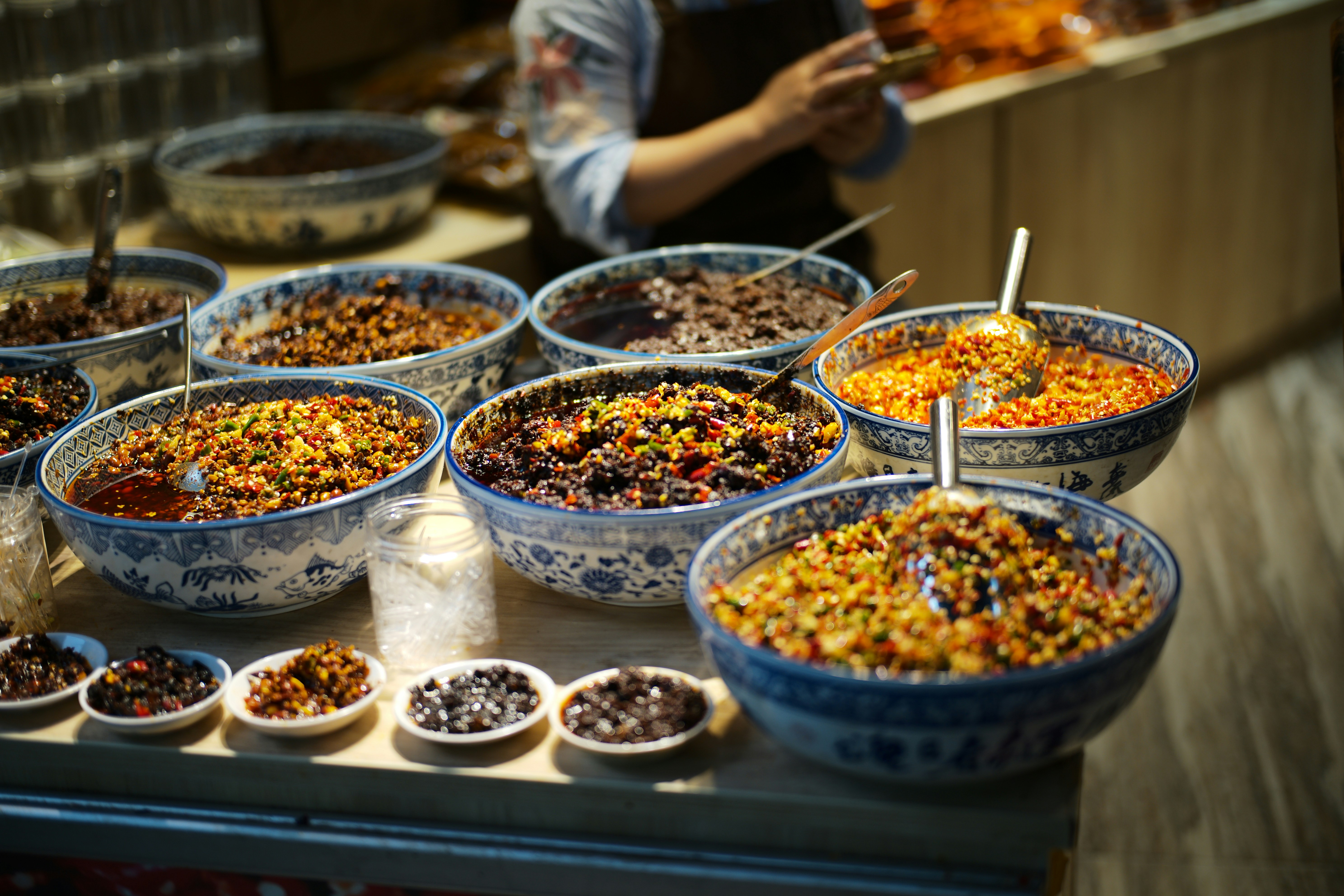 Bowls of various dried spices and ingredients
