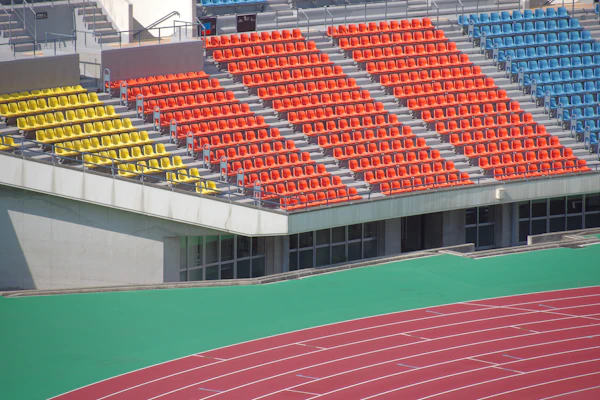 Atlanta stadium - Empty stadium seating in yellow, orange, and blue.