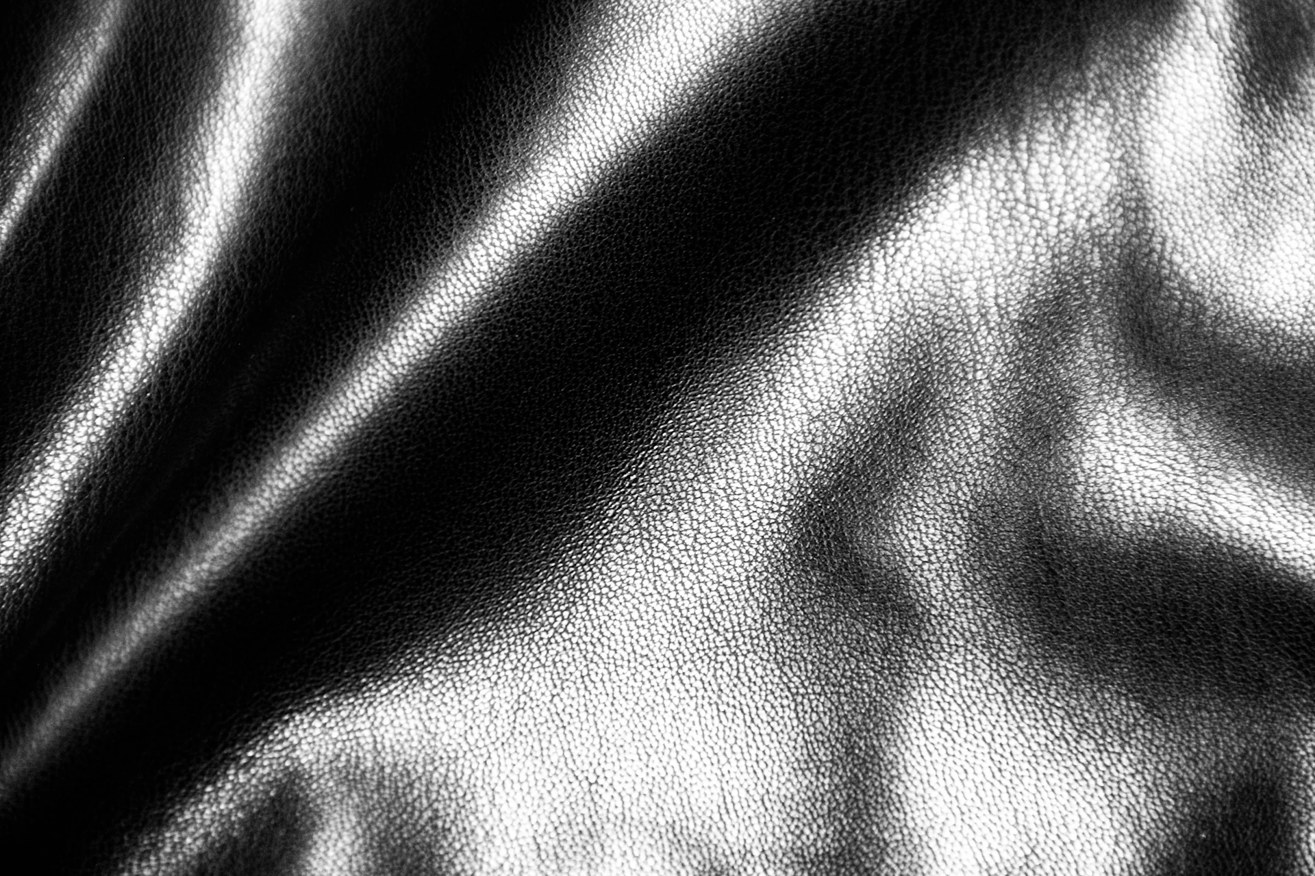 Black and white textured fabric folds