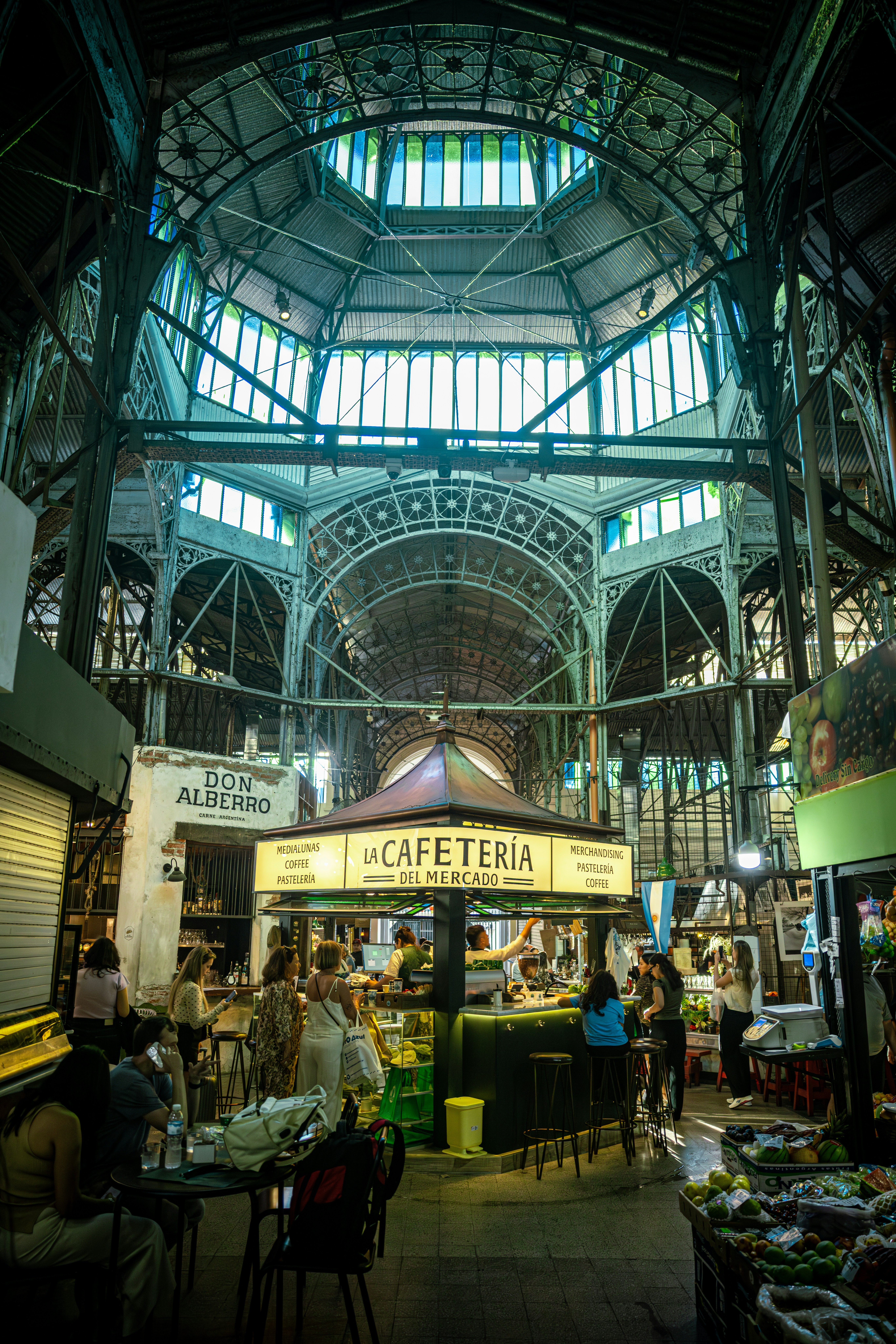 Interior of a bustling market with a cafeteria