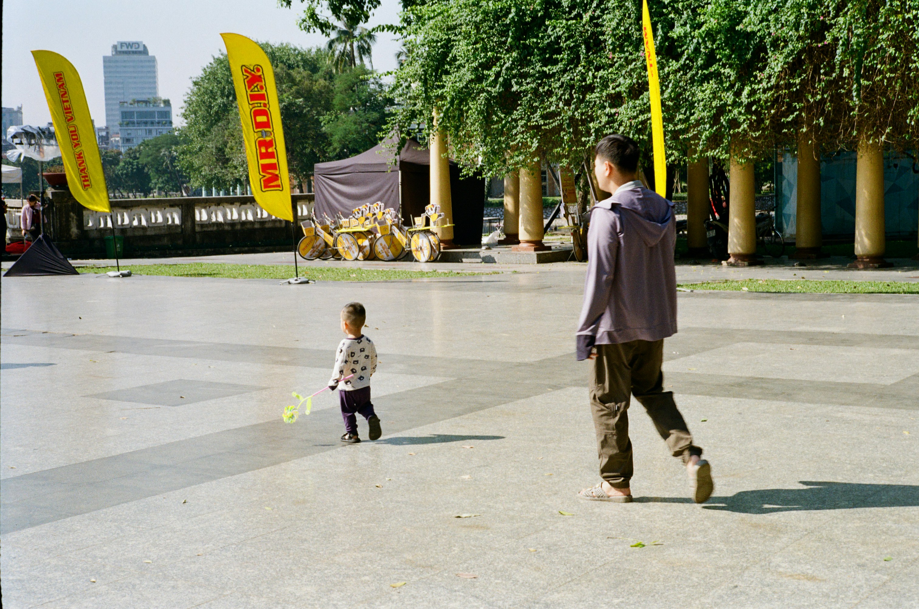 Family enjoying outdoor activities together in a sunny park