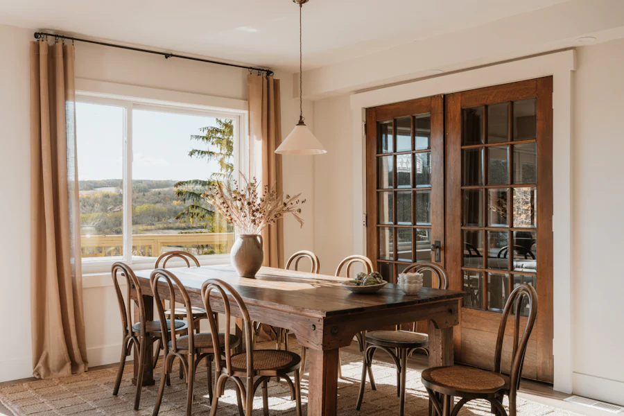 Rustic wooden dining table with chairs