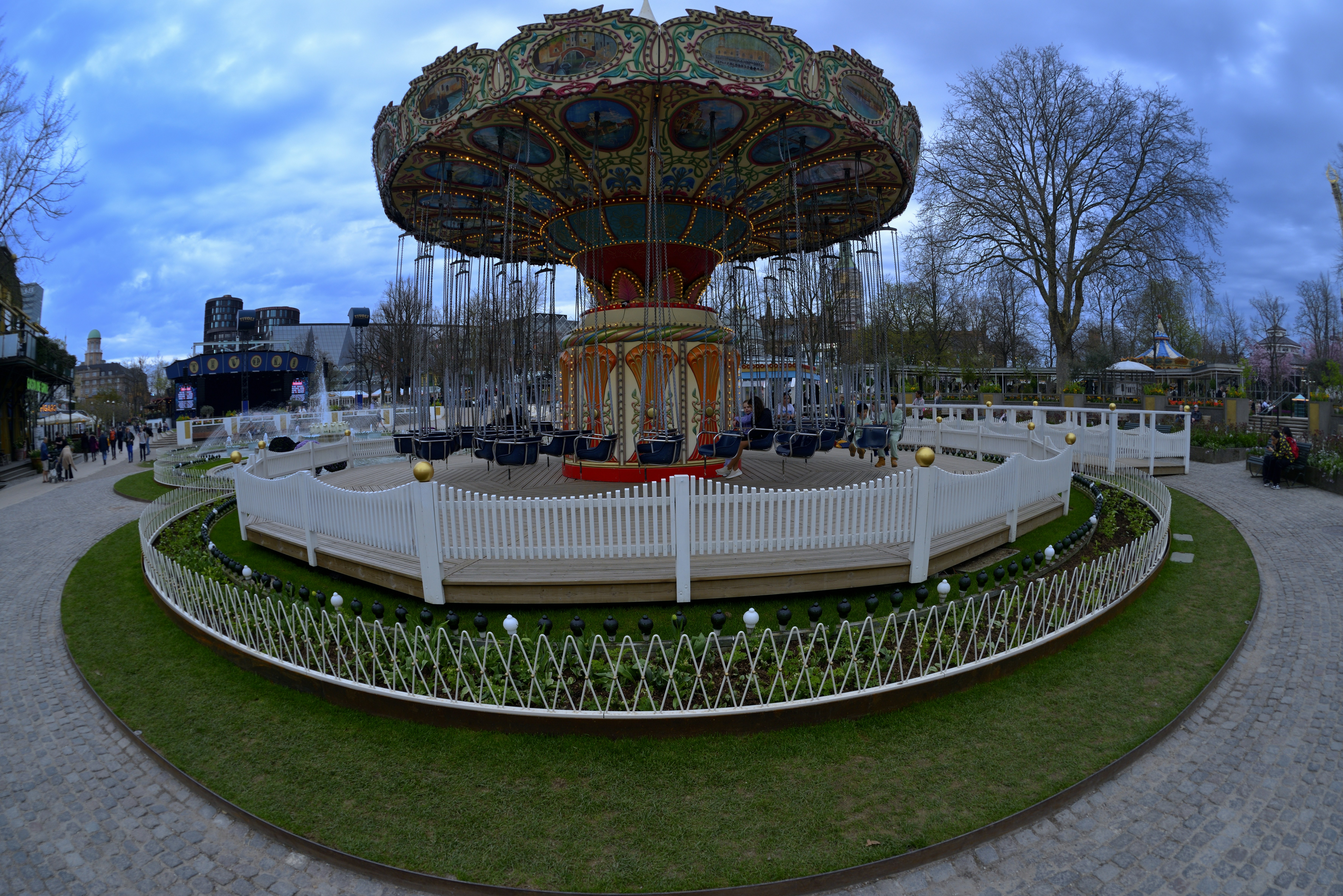 Vintage carousel ride in a park at dusk