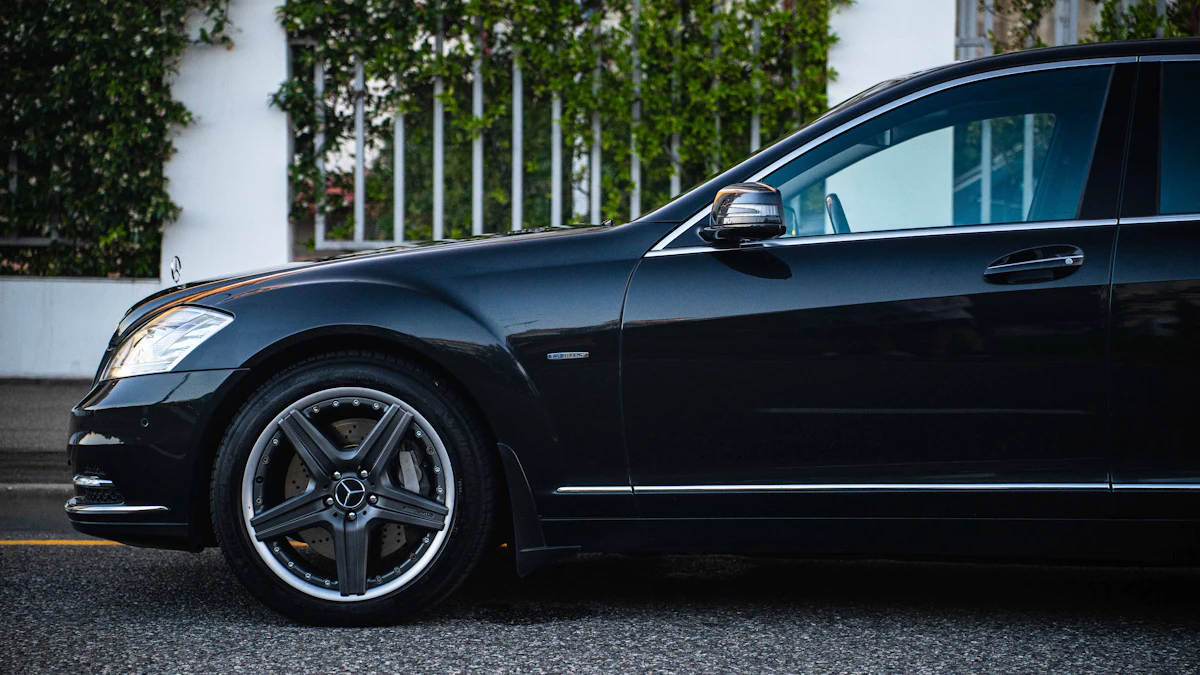 Black luxury sedan on a London street