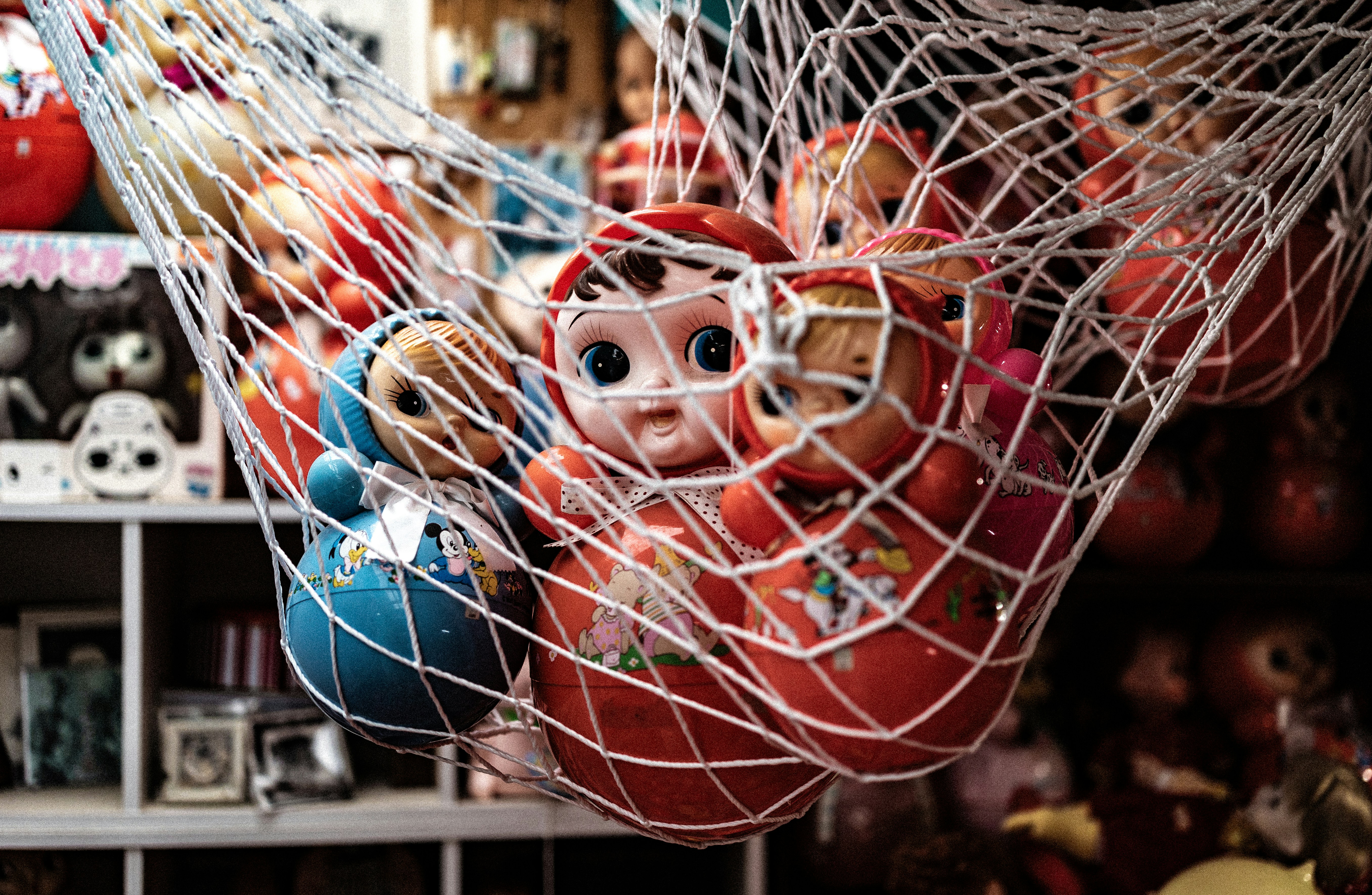 A net full of colorful nesting dolls