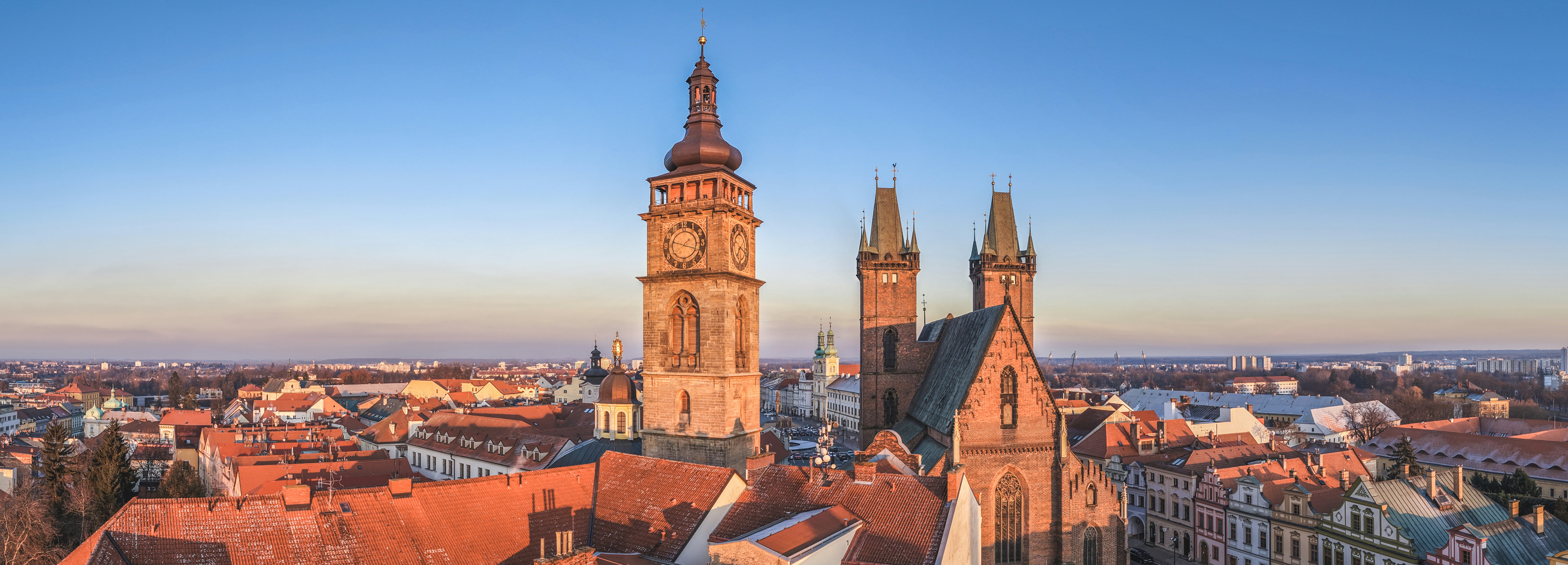 Historic church towers over a european city skyline