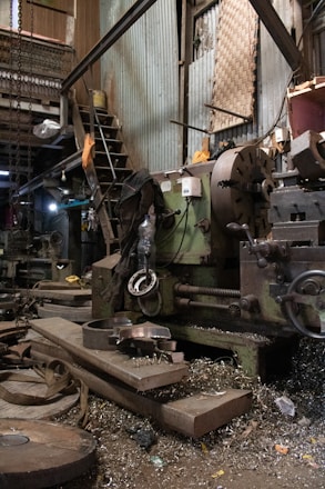 Industrial workshop with lathe and metal shavings