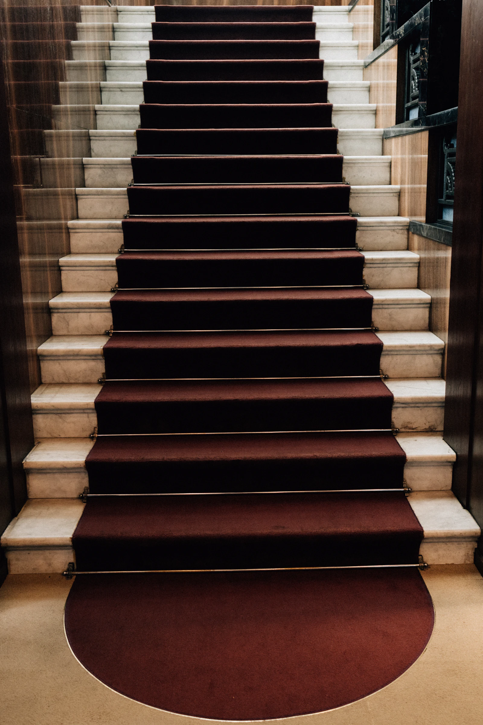 A stair runner leading up to a landing