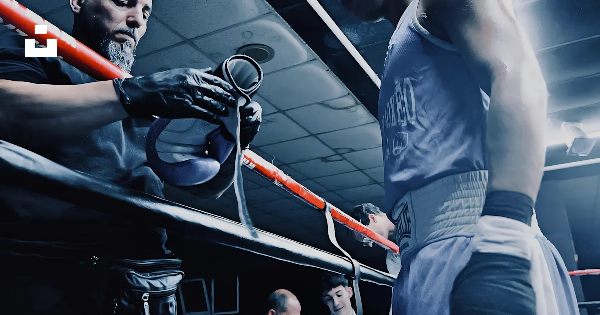 Trainer Cap Boxing Boxer and trainer in a boxing ring with officials photo – Free Focus ...