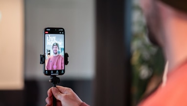 Man filming himself live on smartphone