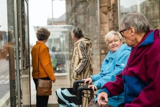 Elderly people waiting at a bus stop