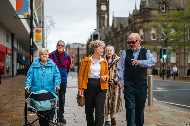 Group of active seniors exploring a city street