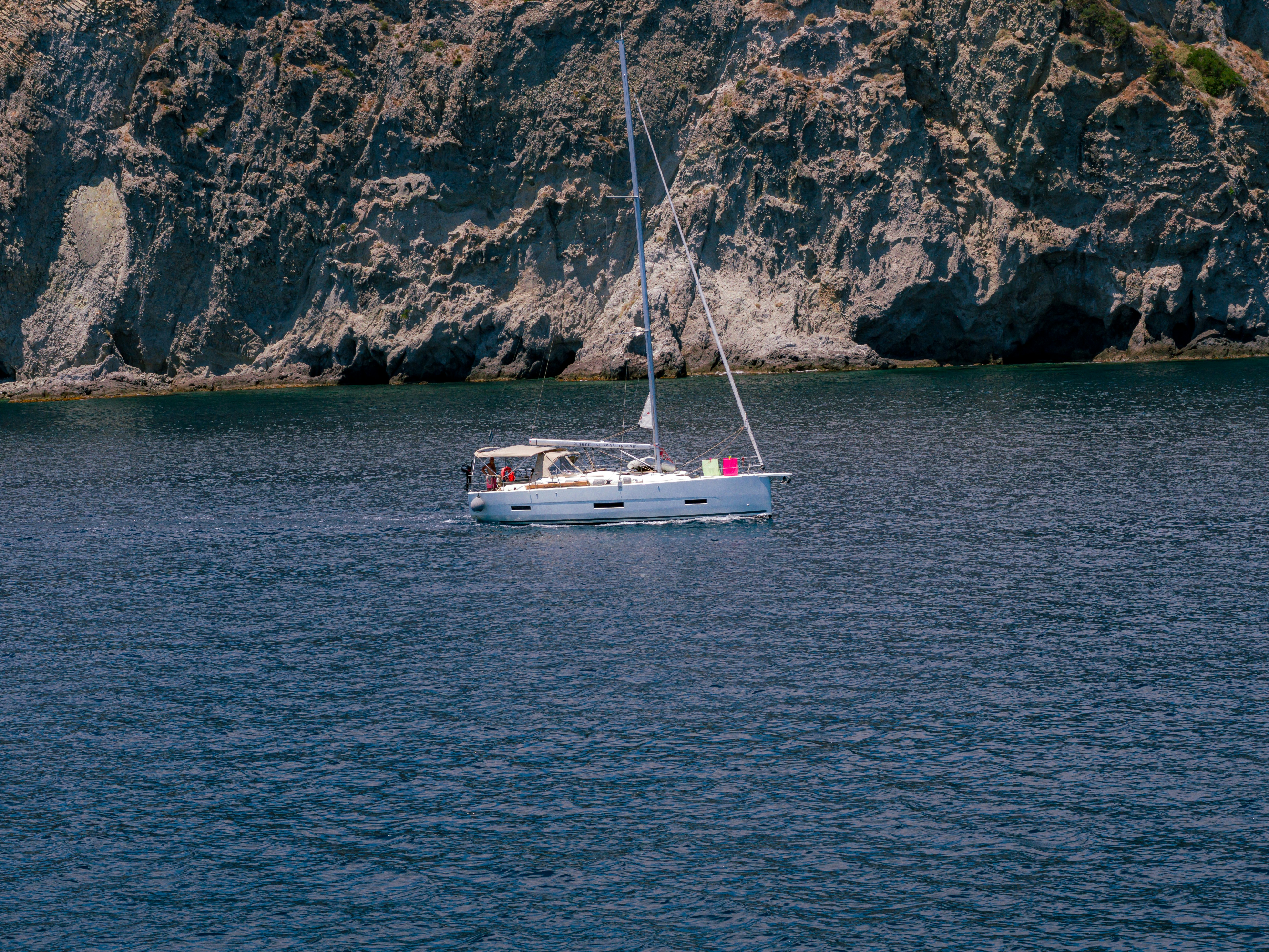 Sailboat on deep blue sea