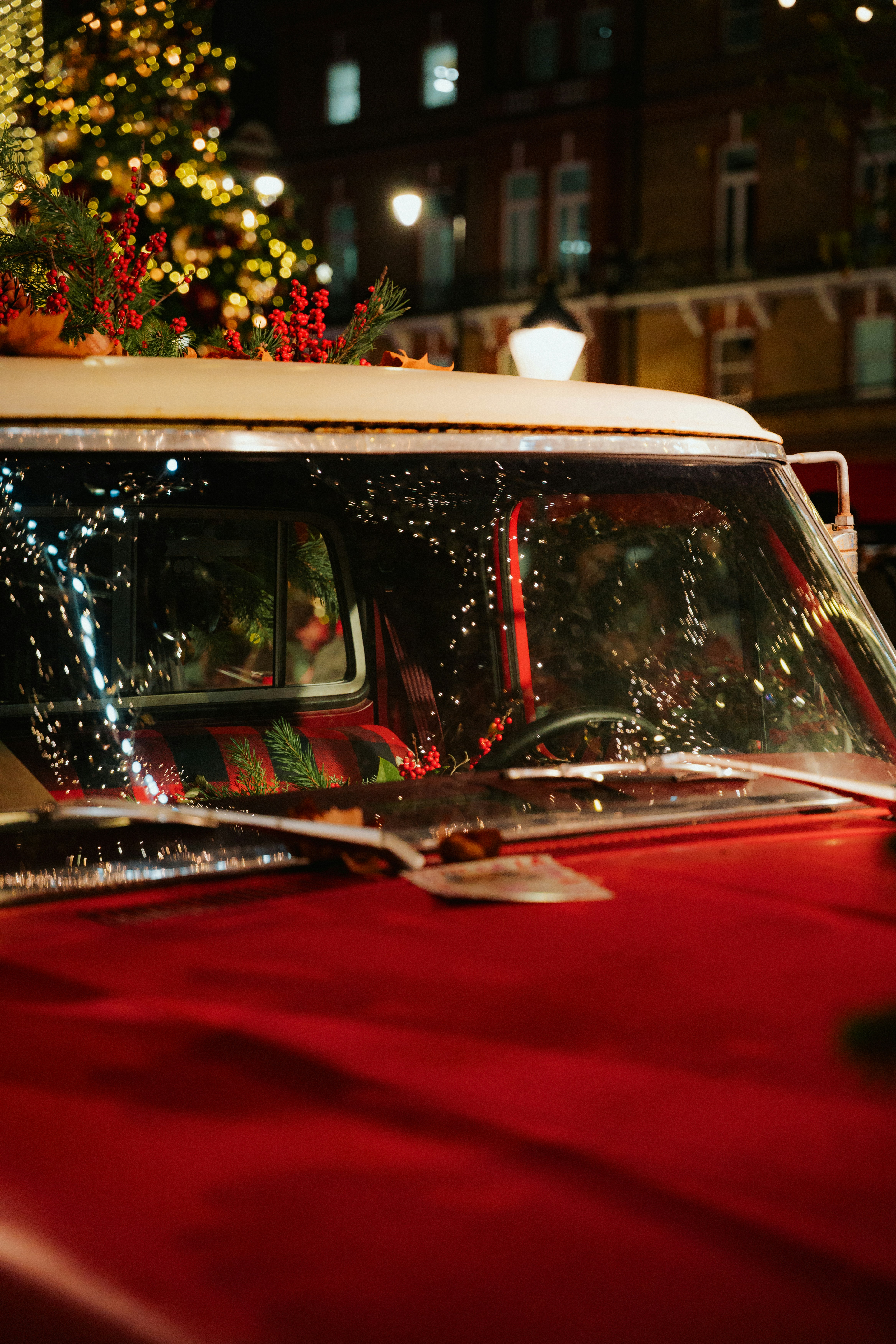 Red vintage van decorated for christmas