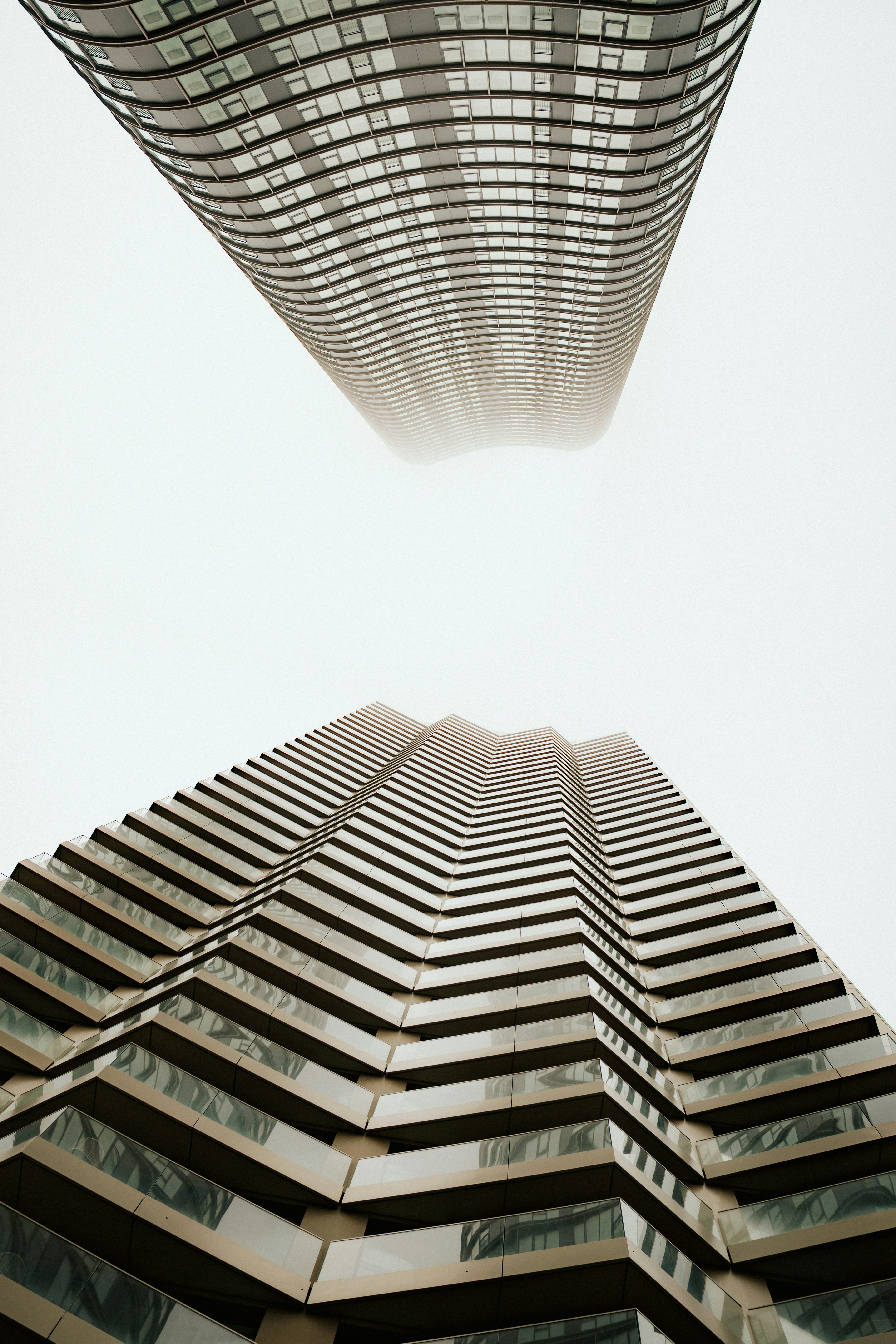 Two modern skyscrapers reaching towards the sky