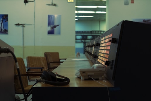 Control room with monitors and chairs