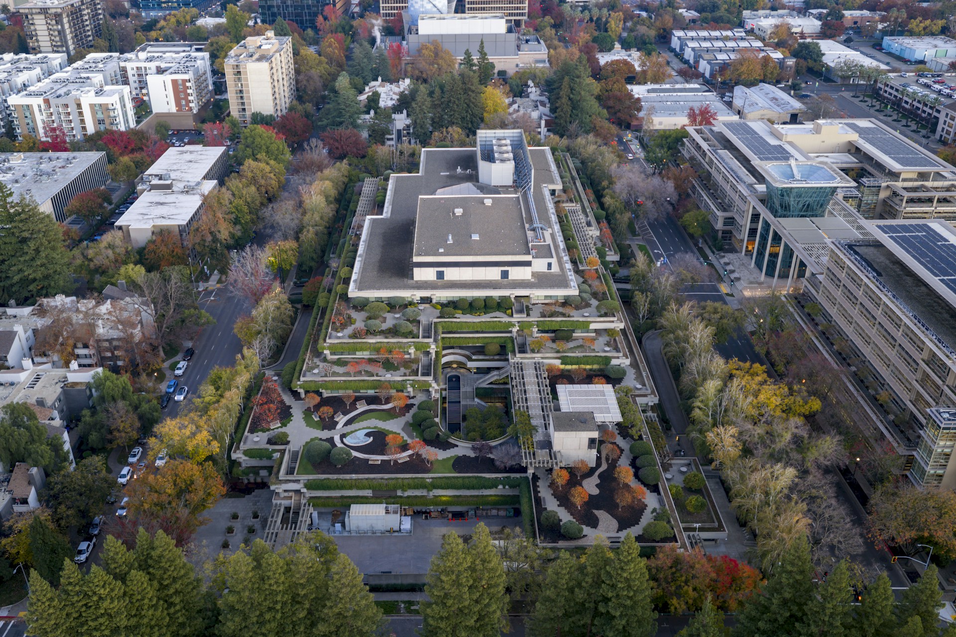 Aerial view of a modern building with gardens below gardens
