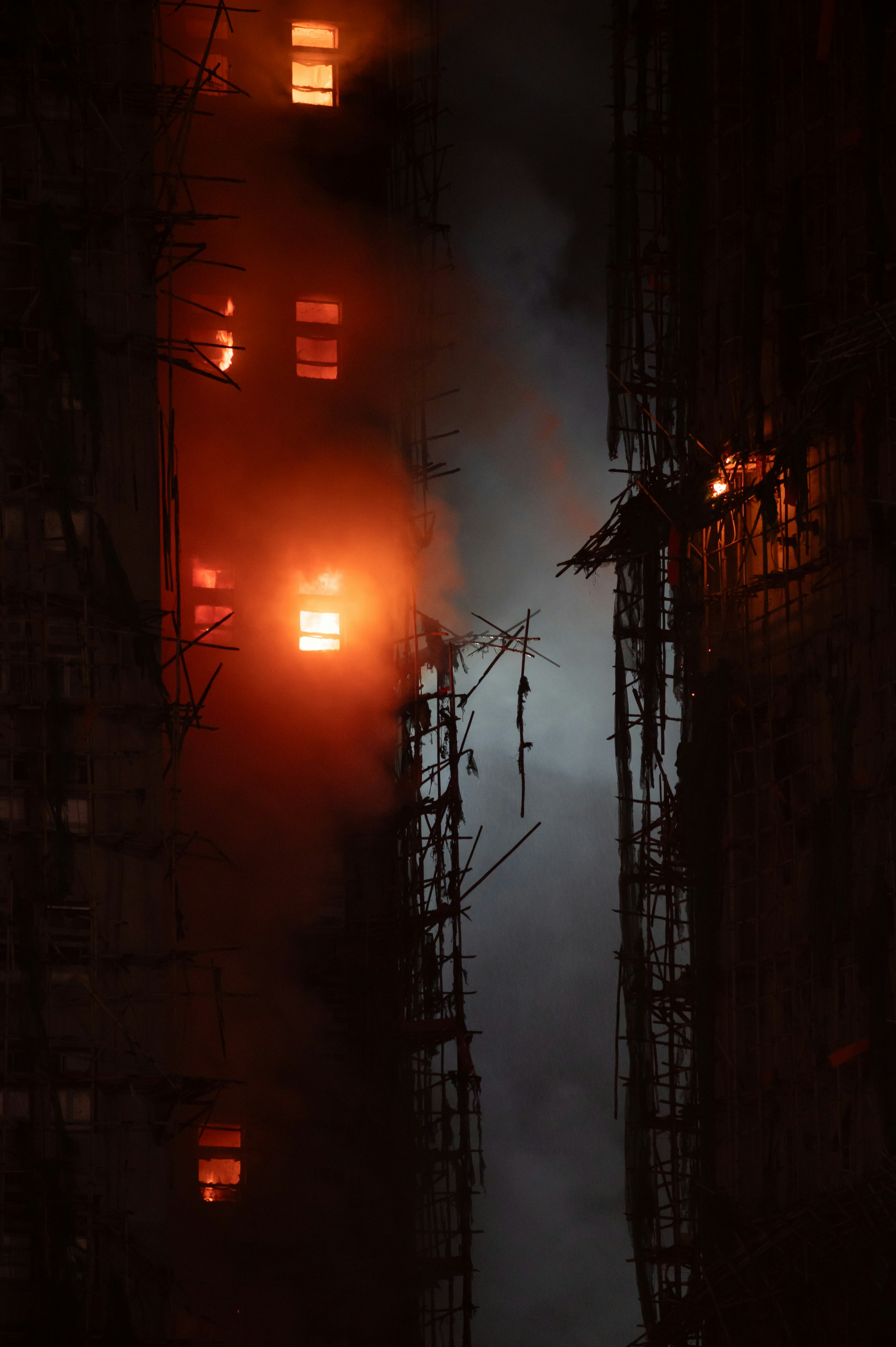 Building engulfed in flames at night