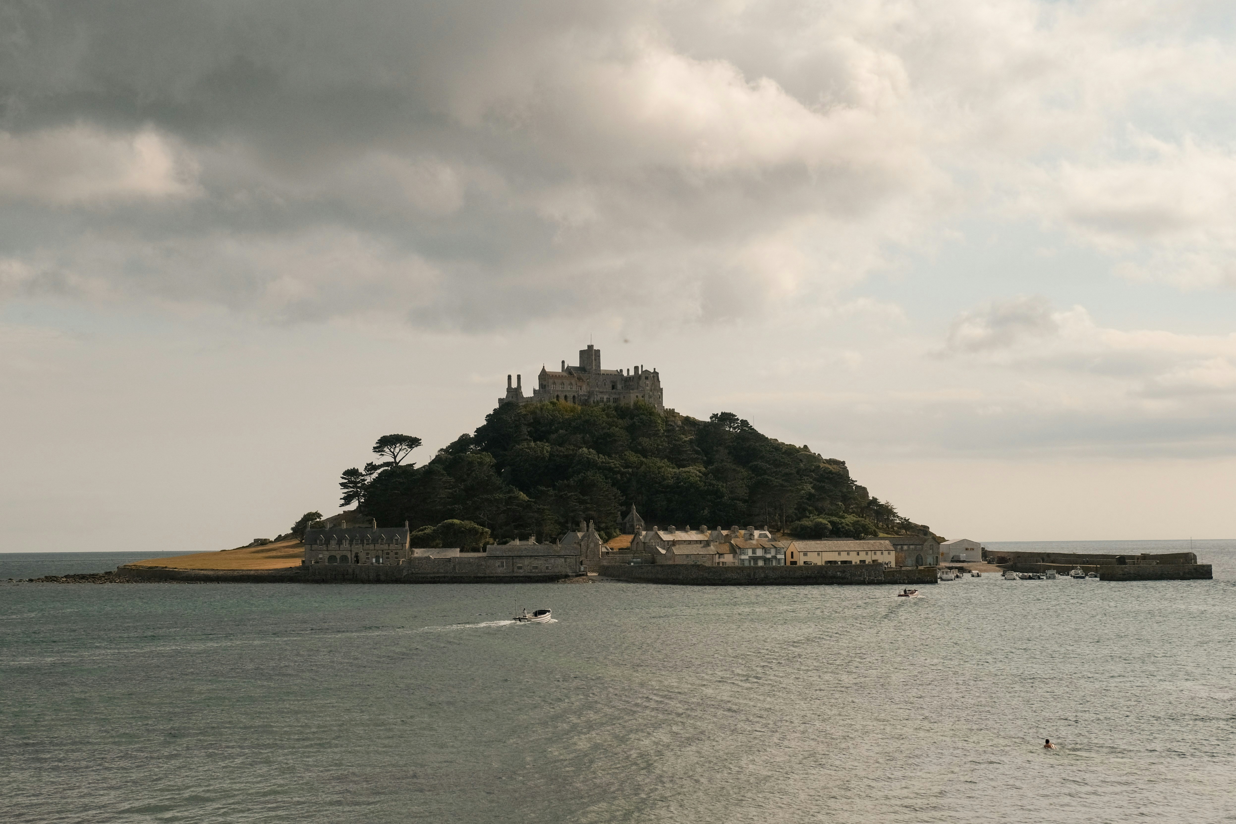Castle on a rocky island surrounded by the sea.