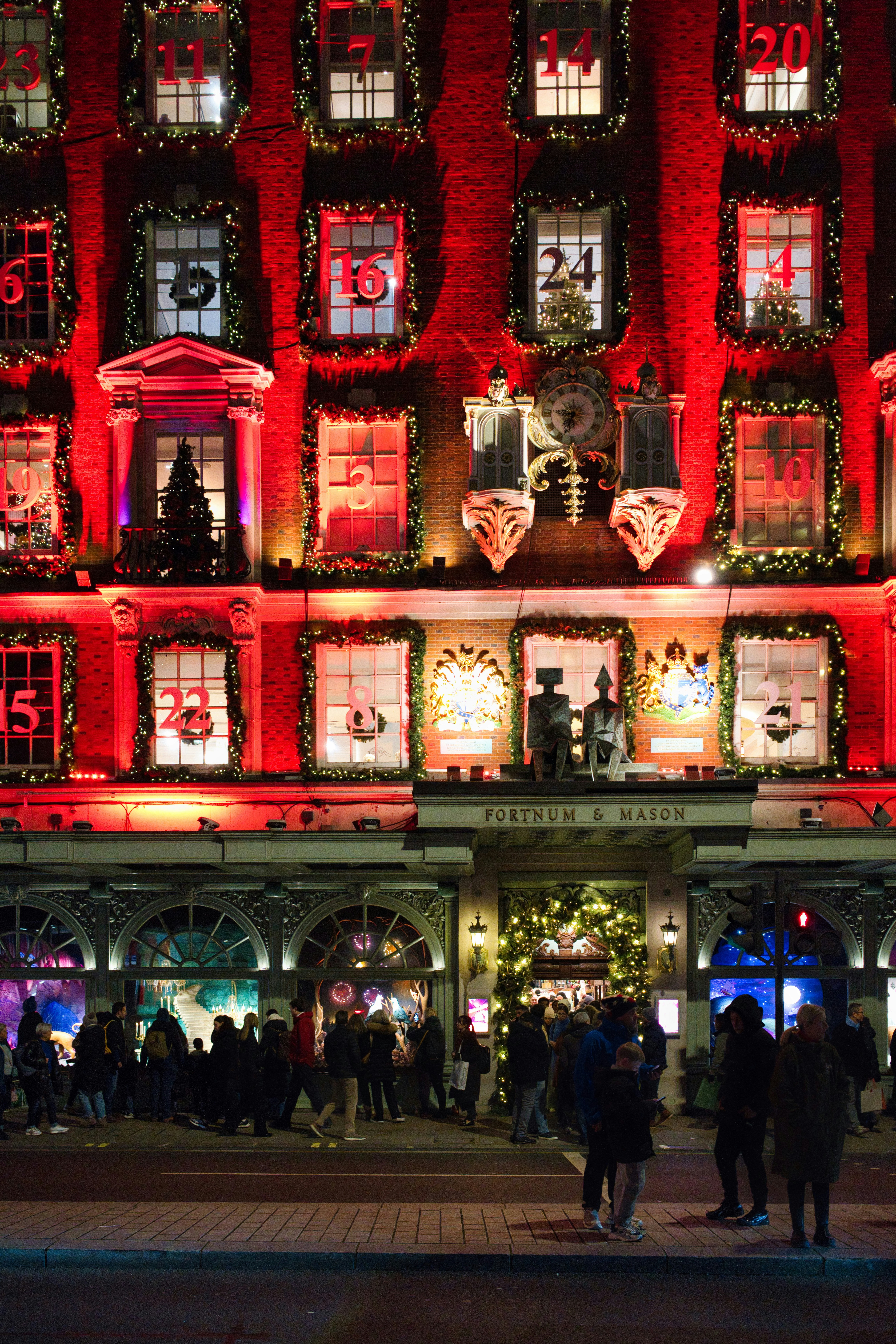 Building decorated with christmas advent calendar windows