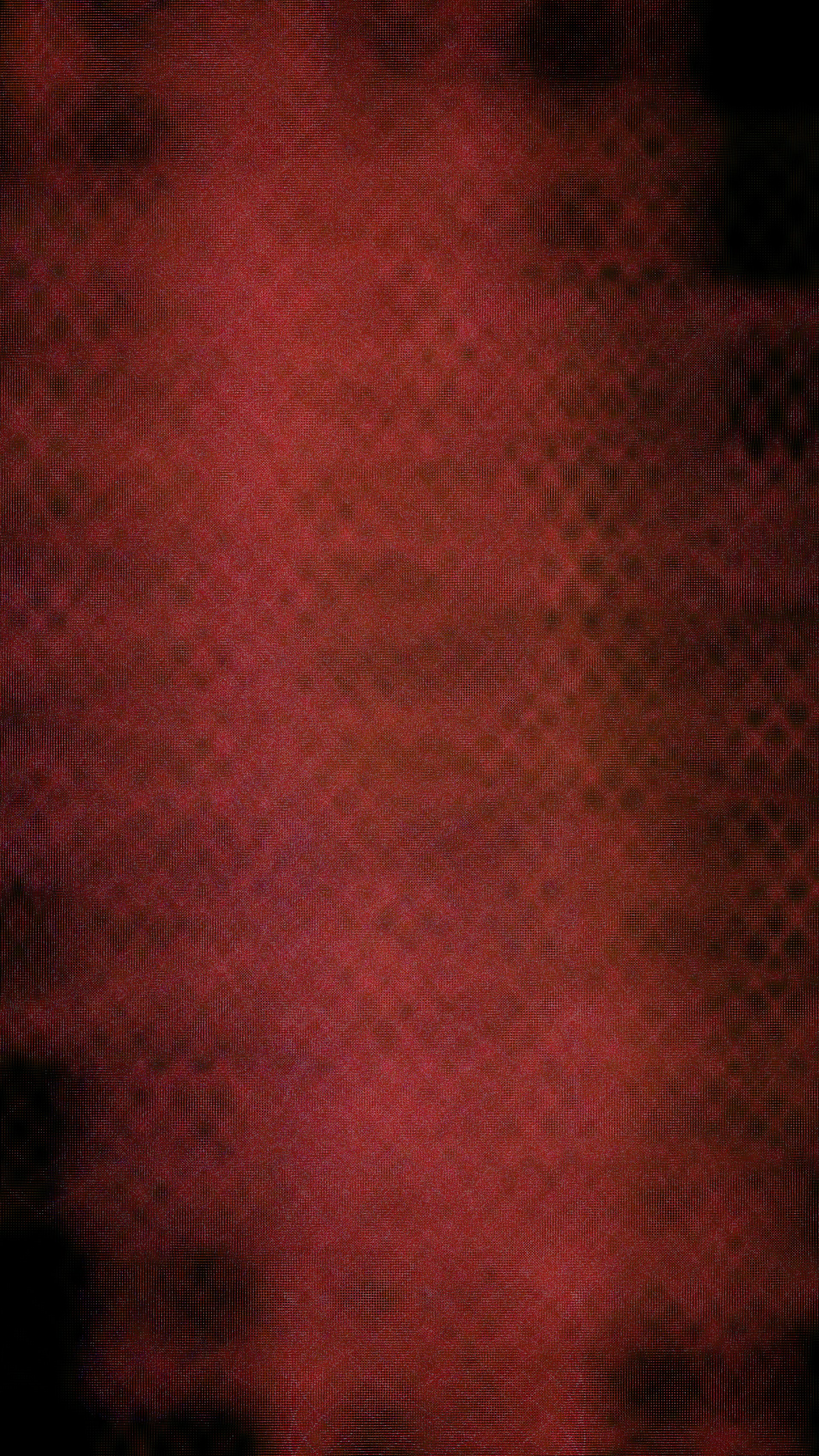 Abstract textured background with red and black tones.